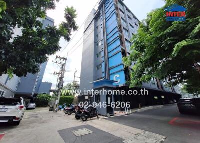 Exterior view of a mid-rise apartment building