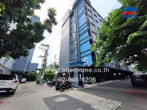 Exterior view of a mid-rise apartment building