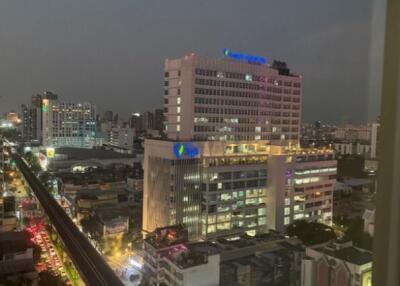 Night view of city buildings with traffic