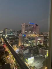 Night view of city buildings with traffic