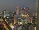 Night view of city buildings with traffic