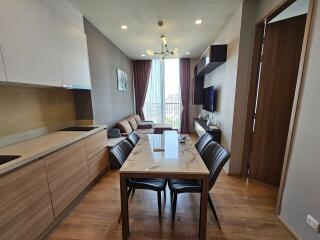 Modern living and dining area with kitchen