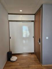 Minimalist entryway with sliding storage