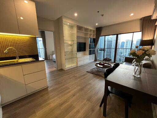 Modern living room with kitchen and dining area