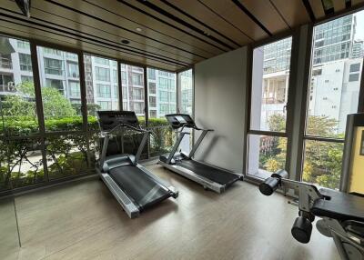 Well-equipped gym with treadmills and exercise machines