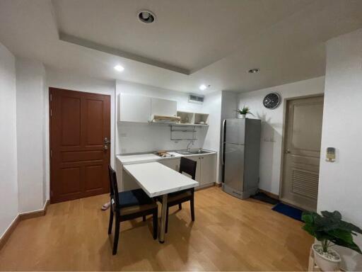 Compact kitchen with dining area