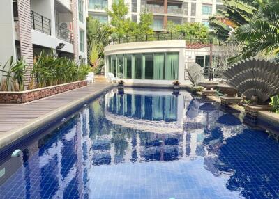 Outdoor swimming pool in modern apartment complex