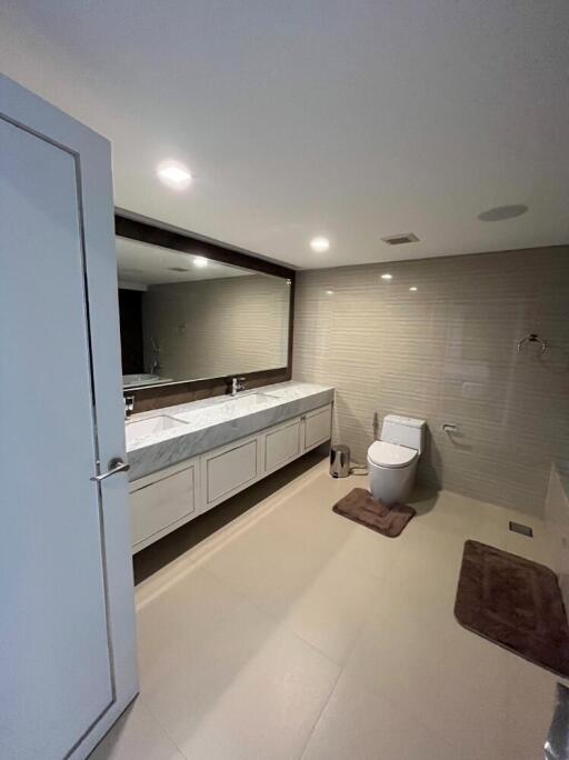 Modern bathroom with double sink and large mirror