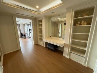 Spacious hallway leading to a bright living area