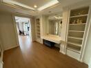 Spacious hallway leading to a bright living area