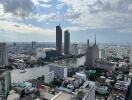 City view with tall buildings and a river