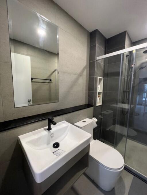 Modern bathroom with shower and vanity