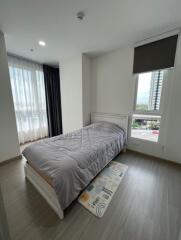 Bedroom with single bed and window