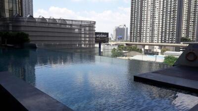 Luxury outdoor infinity pool with city views