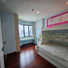 Bedroom with bunk bed and city view