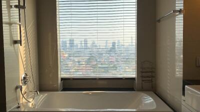 Modern bathroom with city view