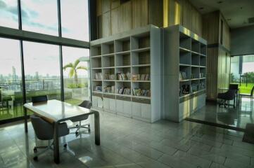 Modern library space with large windows