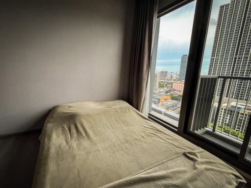 Bedroom with a city view