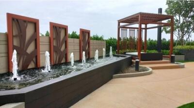 Elegant outdoor feature with water fountains and pergola