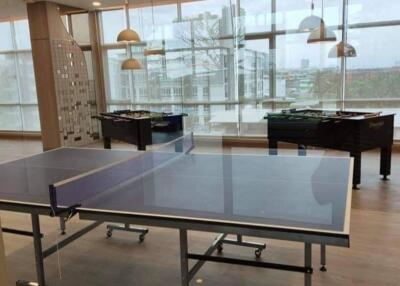 Modern recreation area with table tennis and foosball tables