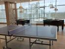 Modern recreation area with table tennis and foosball tables