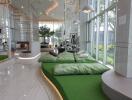 Modern lounge area with large windows and green cushioned seating