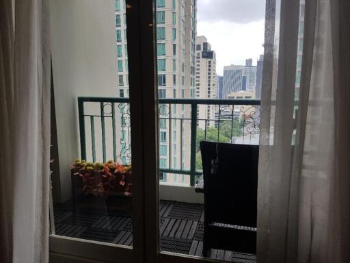 Balcony with a view of city buildings