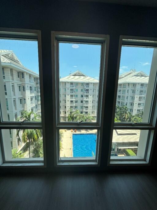 View of building and pool through windows