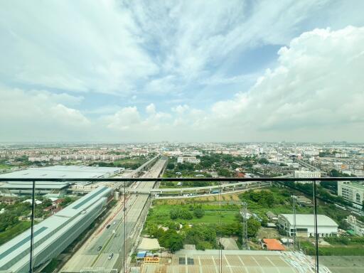 Scenic city view from a high-rise building balcony