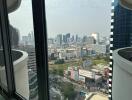 View of the city from a balcony or window of the building