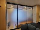 Modern living room with frosted glass partition