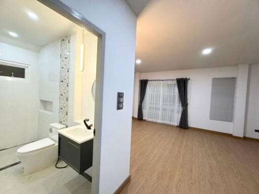 Modern apartment with bathroom and main living space