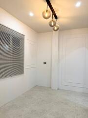 Modern minimalist room with stylish lighting