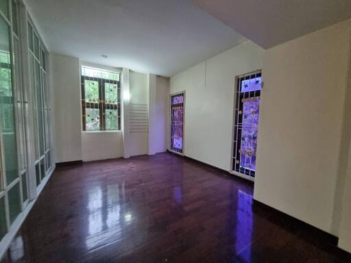 spacious bedroom with large windows