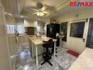 Modern kitchen with marble floor and island