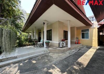 Exterior view of a house with extended patio