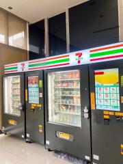 Row of vending machines in a building lobby