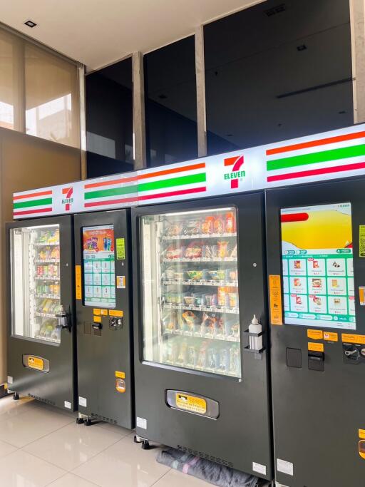 Row of vending machines in a building lobby