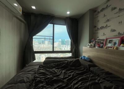 Cozy bedroom with city view