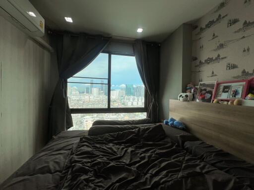 Cozy bedroom with city view