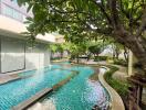 Outdoor swimming pool with a garden