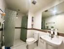 Modern bathroom with fixtures and a large mirror