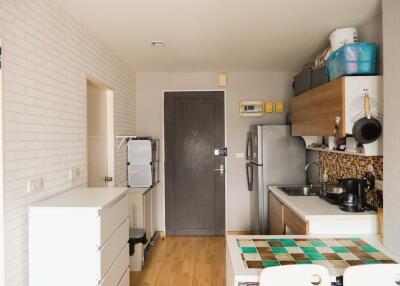 Modern kitchen with appliances and dining area