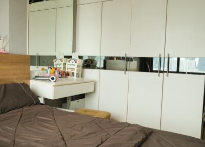 Bedroom with large wardrobe and vanity table