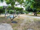 Backyard with trees and a small pavilion