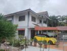 Residential building with garden and covered car park