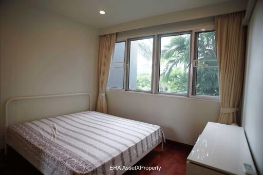 bedroom with a large window