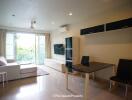 Living room with modern furniture and natural light