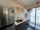 Modern kitchen with stainless steel appliances and ample storage