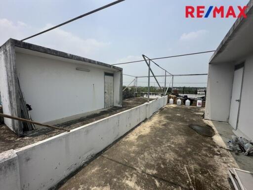 Rooftop with utility shed and open space